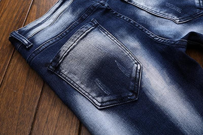 Ciemne jeansy z przetarciami-Bossino