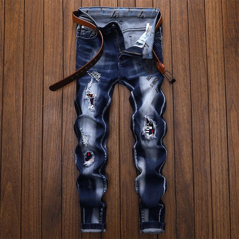 Ciemne jeansy z przetarciami-Bossino