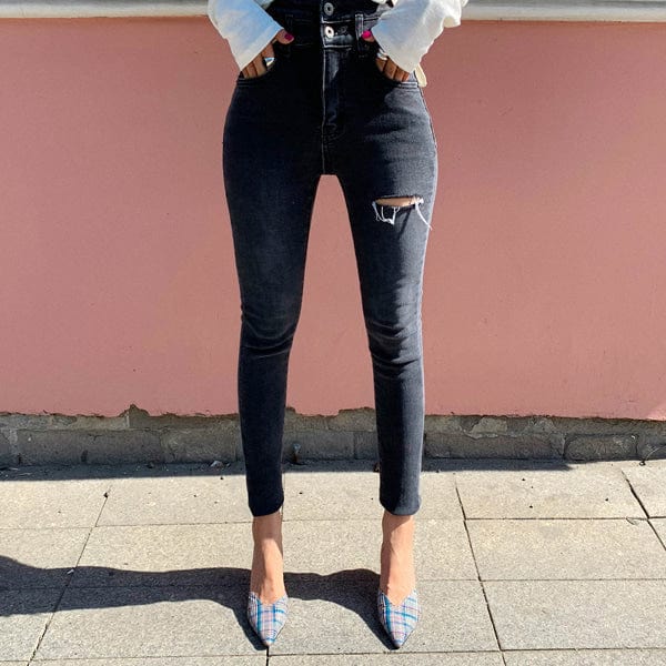 Dopasowane jeansy damskie z rozcięciem-Bossino