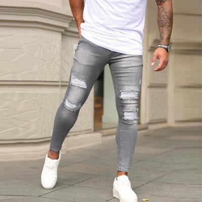 Męskie jeansy slim fit z przetarciami-Bossino