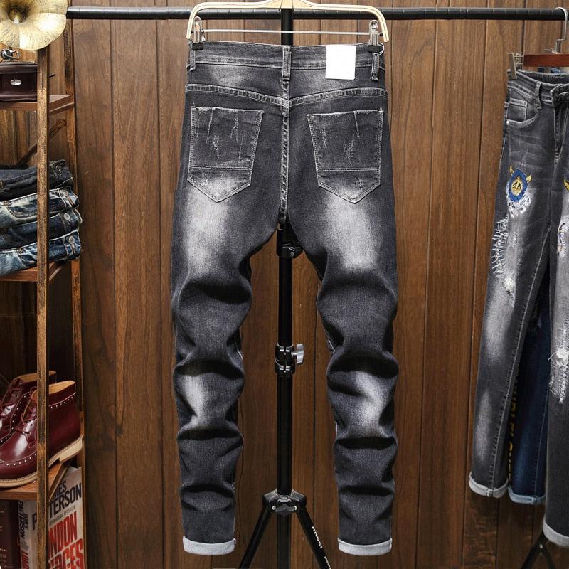 Męskie jeansy z kolorowymi napisami-Bossino