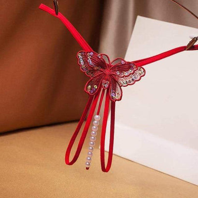 Stringi z koralikami i cekinowym motylkiem-Bossino