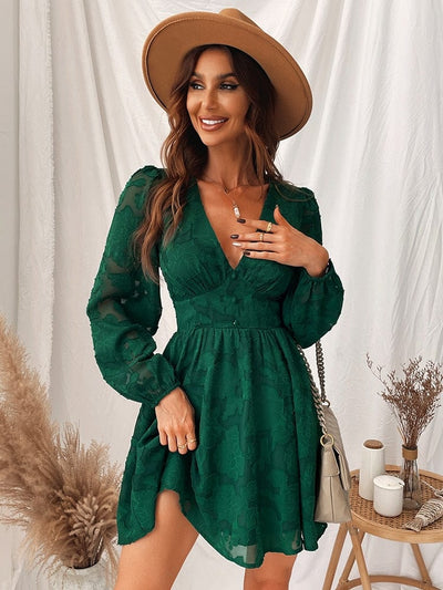 Zielona sukienka mini z głębokim dekoltem-Bossino